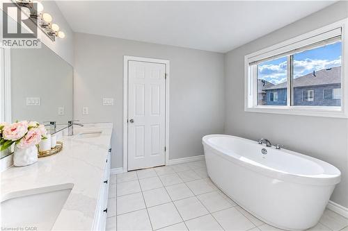 Dual vanity with undermount sinks, quartz countertop, and chrome fixtures - 365 Woolwich Street, Waterloo, ON 