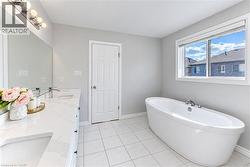 Dual vanity with undermount sinks, quartz countertop, and chrome fixtures - 