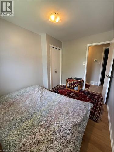 Recessed lighting on a smooth ceiling, neutral wall tones, and wood-finish flooring - 281 Toll Gate Boulevard, Waterloo, ON 
