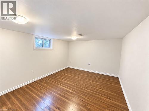 Hardwood-finish flooring with white trim - 84 Weber Street S, Waterloo, ON 