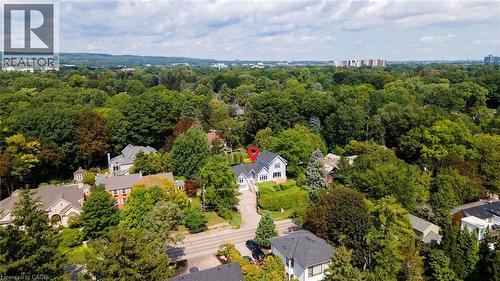 Wooded neighborhood setting with extensive tree canopy - 293 North Shore Boulevard E, Burlington, ON 