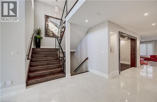 Glossy tiled flooring - 61 Schweitzer Street, Kitchener, ON 