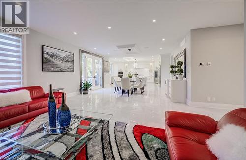 View from Living room to Breakfast area to Kitchen - 61 Schweitzer Street, Kitchener, ON 