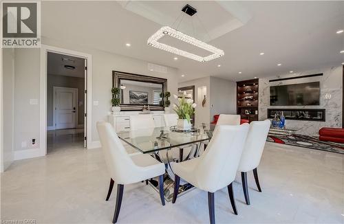 Large table seating can be seen here - 61 Schweitzer Street, Kitchener, ON 