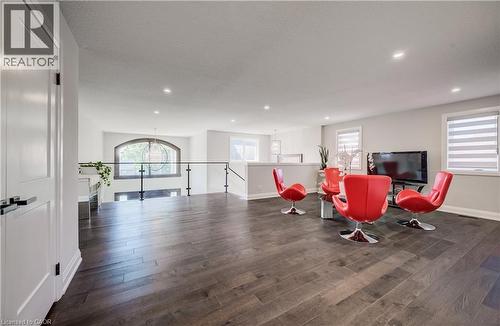 Second floor family room, engineered hardwood flooring, lots of natural light and pot lights - 61 Schweitzer Street, Kitchener, ON 
