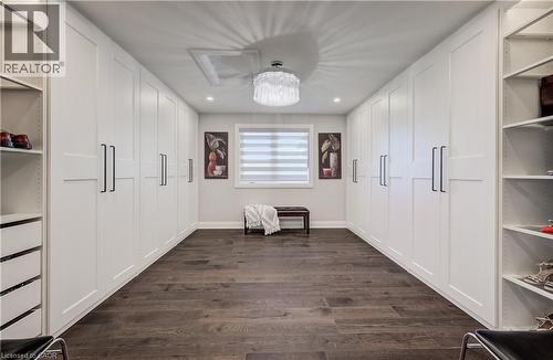 WOW!!!!! Sharable his & hers walk-in closet with custom organizer cupboards having pull out drawers - 61 Schweitzer Street, Kitchener, ON 