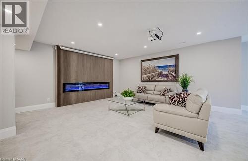 Horizontal electric fireplace, screen & projector included - 61 Schweitzer Street, Kitchener, ON 