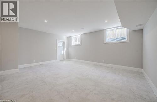 Basement level walk up door to large entry.....perfect for a pool table, office area, hobby area - 61 Schweitzer Street, Kitchener, ON 