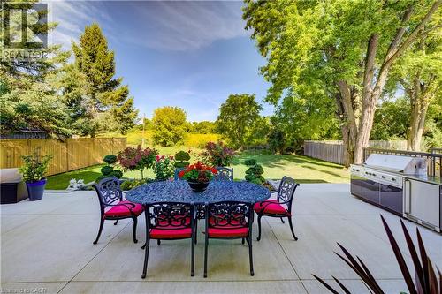 View to rear yard from rear concrete patio - 61 Schweitzer Street, Kitchener, ON 