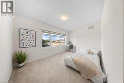 Carpeted bedroom with baseboards - 