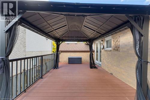 Upper portion of Multi-tier composite deck with gazebo. - 77 Yellow Birch Drive, Kitchener, ON 