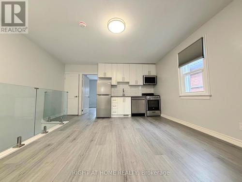 UPPER - 408 STRATHMORE BOULEVARD , Toronto, Ontario M4C 1N5 5
