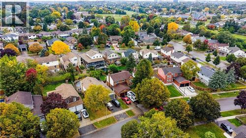 Aerial perspective of a tree-lined residential neighborhood - 104 Deerwood Crescent, Kitchener, ON 