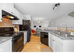 #83 8304 11 AV SW  Edmonton, AB T6X 1J8