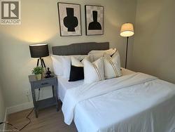 Light-toned wall paint with wood-finish flooring - 