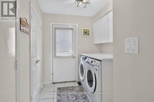 Laundry Room, Access To Garage & Side Yard - 1634 Tipperary Court, Mississauga, ON 