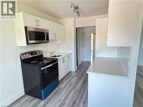 54 COUNTRY HILL Drive Unit# 318 , Kitchener, Ontario N2E 1R7 4