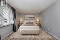 Virtually staged primary bedroom - 