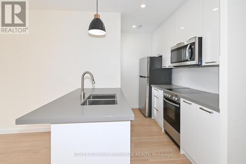 UPPER - 113 WOODBINE AVENUE , Toronto, Ontario M4L 3P1 3