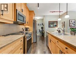 Lovely kitchen with large island, stainless steel appliances - 