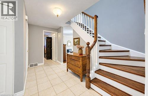Ceramic flooring and hardwood stairs - 469 Westvale Drive, Waterloo, ON 