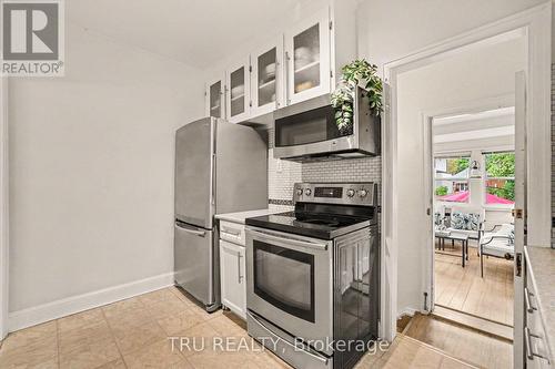 Kitchen extends to dining room and sunroom - 51 Merritt Avenue, Ottawa, ON 