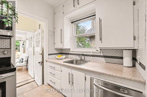 Kitchen extends to dining room and sunroom - 51 Merritt Avenue, Ottawa, ON 