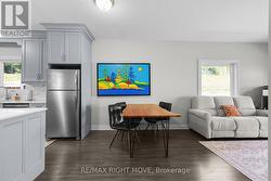 Dining area between kitchen and living room areas - 