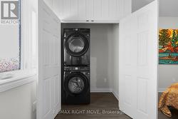 Stacked laundry with room for storage shelf - 