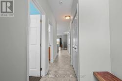 Inviting foyer with coat closet and garage access - 