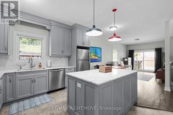 Large updated kitchen with centre island - 