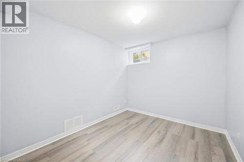 Recessed window, overhead lighting, and wood-finish flooring - 233 Dearborn Boulevard, Waterloo, ON 
