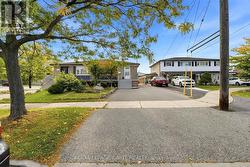 4 BUTTERCUP COURT Toronto, ON M9L 2M9