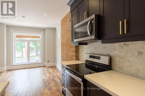MAIN - 936 DUNDAS STREET E , Toronto, Ontario M4M 1R3 2
