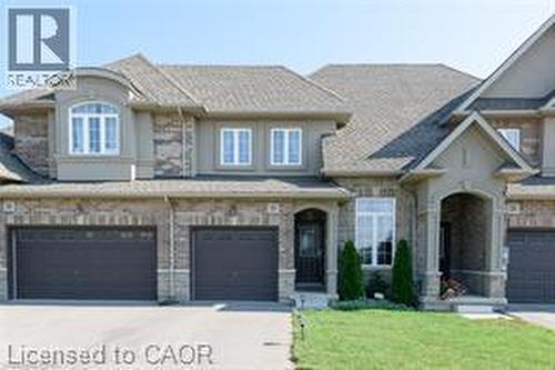 Stone and stucco exterior with multiple gables - 28 Madonna Drive, Hamilton, ON 