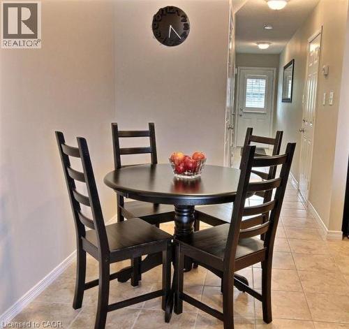 Tiled flooring, interior doorway with louvered blinds, and recessed lighting - 507 Beaumont Crescent, Kitchener, ON 