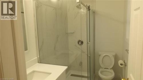 Walk-in shower with clear glass enclosure and large format wall tile - 68 Austin Drive, Waterloo, ON 