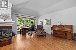 Living Room with Fireplace and Patio Access - 