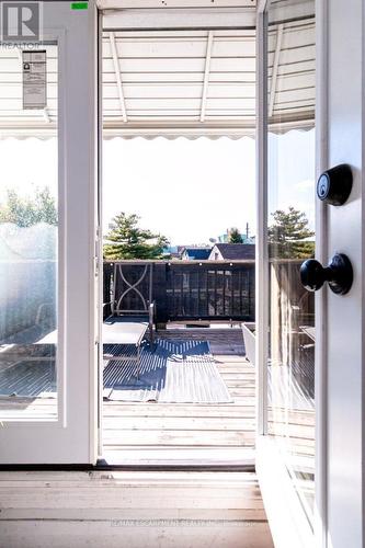 Second Floor Kitchen with doors leading to Deck - 548 Beach Road, Hamilton, ON 
