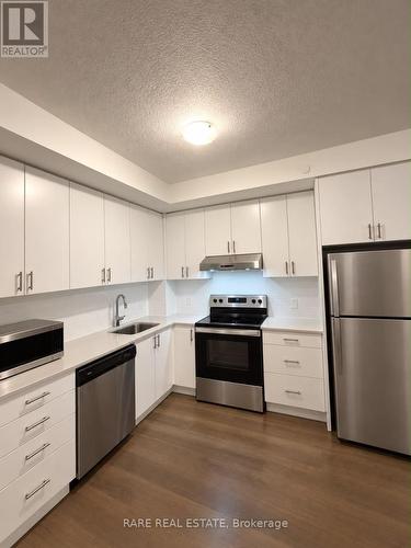 518 - 3200 WILLIAM COLSTON AVENUE , Oakville, Ontario L6H 7W6 2