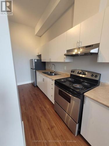 203 - 19 DUNLOP STREET W , Barrie, Ontario L4N 1A1 4