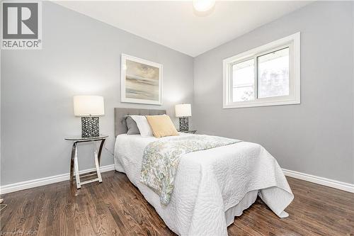 Wood-finish flooring with crisp white trim - 388 Appleby Line, Burlington, ON 