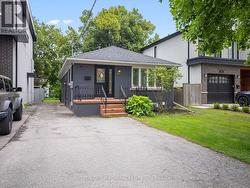 65 WOODBURY ROAD  Toronto, ON M8W 1X8