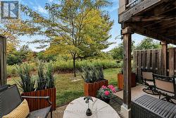 Walk out to private patio from family room. - 