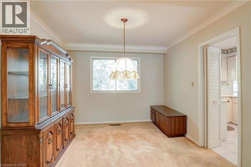 Crown molding detailing, overhead lighting fixture, and window - 8 Bonnylyn Drive, Kitchener, ON 