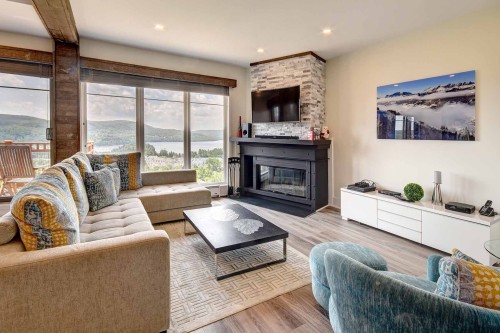 Salon - 7-170 Ch. Au Pied-De-La-Montagne, Mont-Tremblant, QC - Indoor Photo Showing Living Room With Fireplace