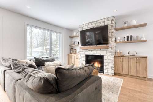 Salon - Rue Des Cèdres, L'Assomption, QC - Indoor Photo Showing Living Room With Fireplace