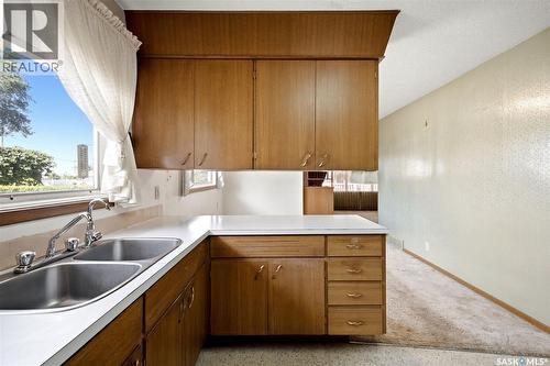 4023 Mcphail Avenue, Regina, SK - Indoor Photo Showing Kitchen With Double Sink