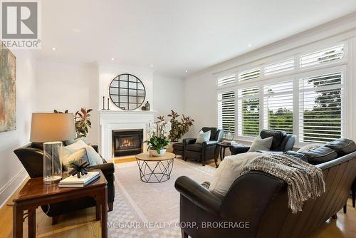 Bright family room with gas fireplace - 39 Yates Street, St. Catharines (Downtown), ON - Indoor With Fireplace