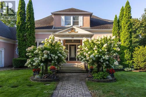Grand porch with perennials - 39 Yates Street, St. Catharines (Downtown), ON - Outdoor
